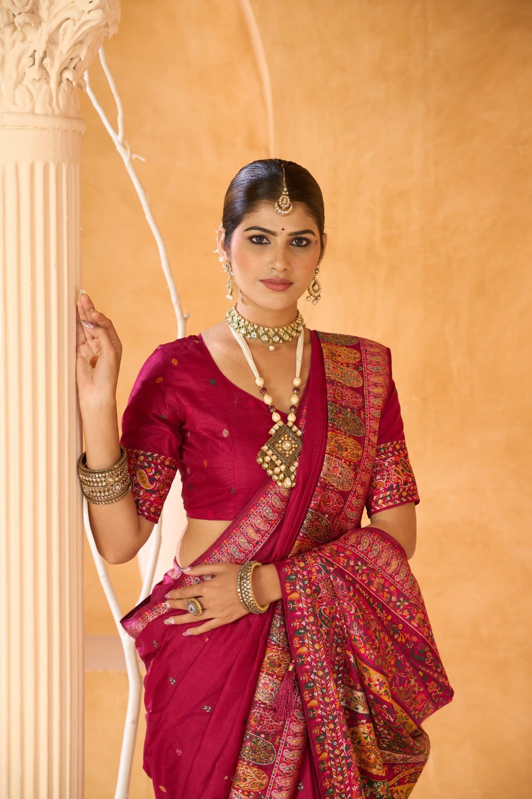 Regal Rani Pink Traditional Saree with Intricate Ethnic Border