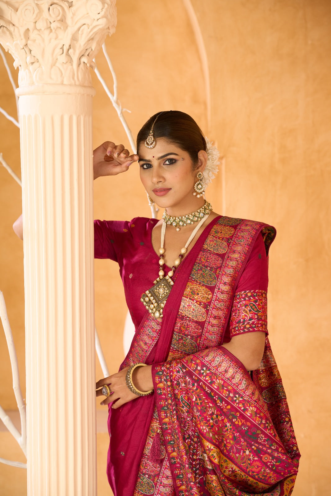 Regal Rani Pink Traditional Saree with Intricate Ethnic Border