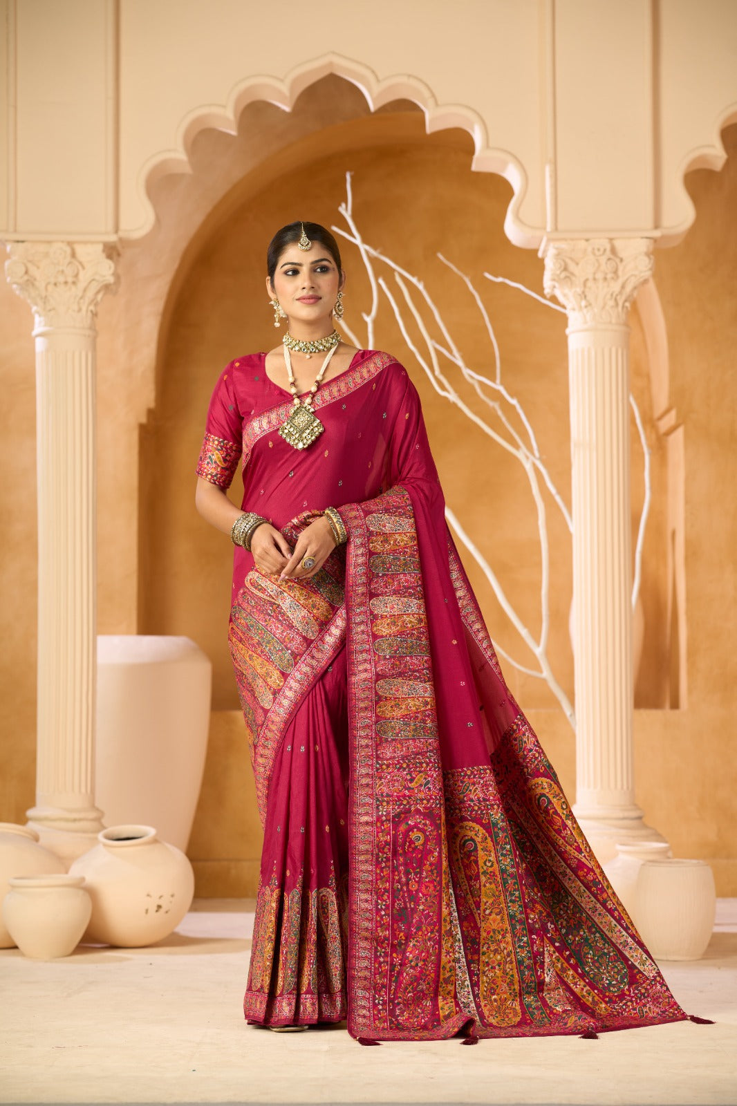 Regal Rani Pink Traditional Saree with Intricate Ethnic Border