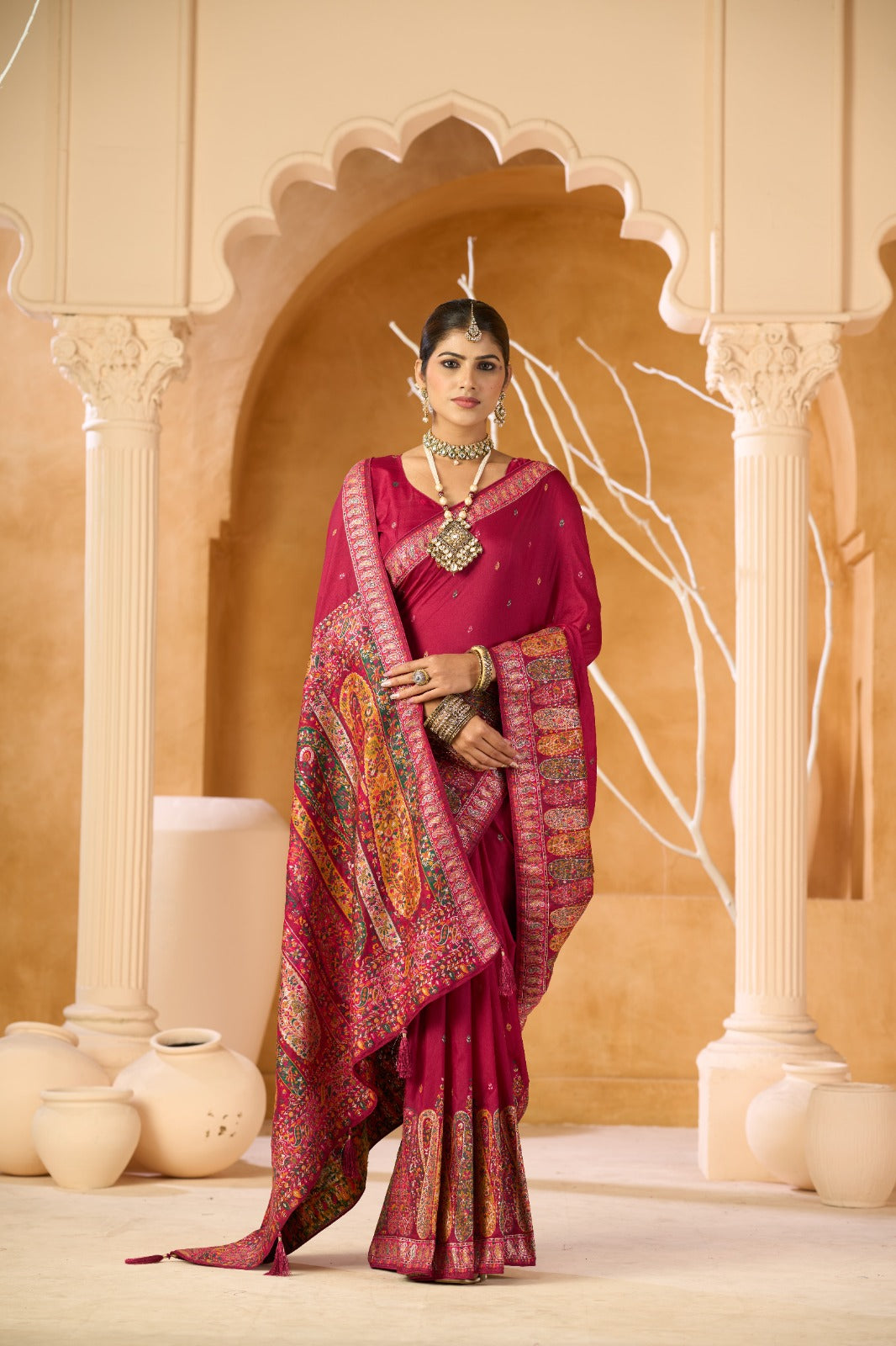 Regal Rani Pink Traditional Saree with Intricate Ethnic Border